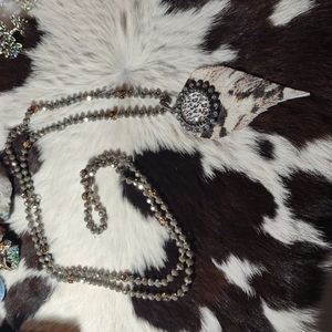 Necklace with leather and leopard print design